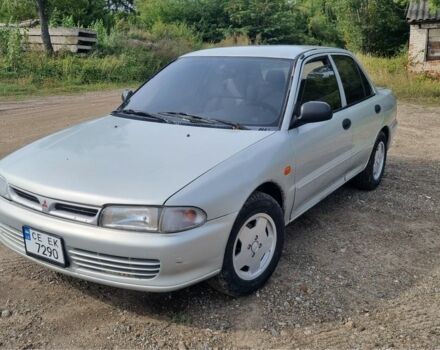 Сірий Міцубісі Lancer, об'ємом двигуна 1.3 л та пробігом 1 тис. км за 2000 $, фото 3 на Automoto.ua