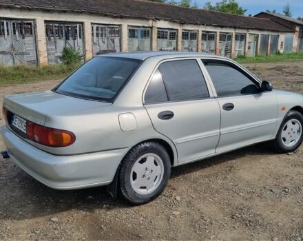 Сірий Міцубісі Lancer, об'ємом двигуна 1.3 л та пробігом 1 тис. км за 2000 $, фото 2 на Automoto.ua