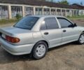 Сірий Міцубісі Lancer, об'ємом двигуна 1.3 л та пробігом 1 тис. км за 2000 $, фото 2 на Automoto.ua