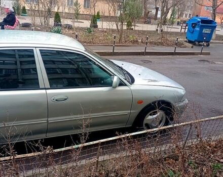 Сірий Міцубісі Lancer, об'ємом двигуна 1.3 л та пробігом 1 тис. км за 2000 $, фото 10 на Automoto.ua