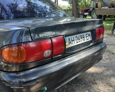 Серый Мицубиси Лансер, объемом двигателя 0 л и пробегом 111 тыс. км за 57000 $, фото 2 на Automoto.ua