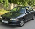 Серый Мицубиси Лансер, объемом двигателя 1.5 л и пробегом 270 тыс. км за 1400 $, фото 1 на Automoto.ua