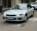 Серый Мицубиси Лансер, объемом двигателя 1.3 л и пробегом 276 тыс. км за 1800 $, фото 1 на Automoto.ua