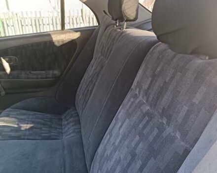 Серый Мицубиси Лансер, объемом двигателя 1.3 л и пробегом 390 тыс. км за 1800 $, фото 8 на Automoto.ua