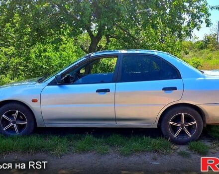 Сірий Міцубісі Lancer, об'ємом двигуна 1.3 л та пробігом 140 тис. км за 3500 $, фото 3 на Automoto.ua