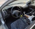 Сірий Міцубісі Lancer, об'ємом двигуна 1.3 л та пробігом 371 тис. км за 990 $, фото 6 на Automoto.ua