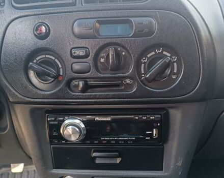 Серый Мицубиси Лансер, объемом двигателя 1.3 л и пробегом 390 тыс. км за 1800 $, фото 14 на Automoto.ua