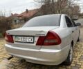 Серый Мицубиси Лансер, объемом двигателя 1.3 л и пробегом 320 тыс. км за 1450 $, фото 6 на Automoto.ua