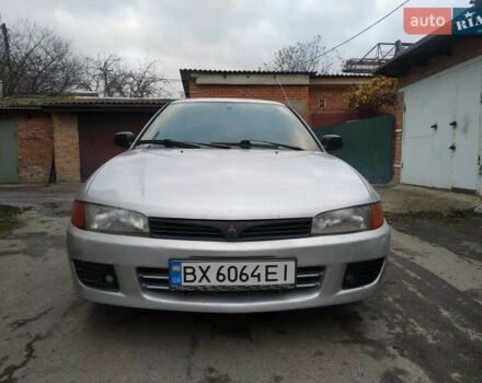 Серый Мицубиси Лансер, объемом двигателя 1.3 л и пробегом 367 тыс. км за 1050 $, фото 1 на Automoto.ua