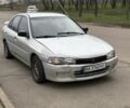 Сірий Міцубісі Lancer, об'ємом двигуна 1.3 л та пробігом 200 тис. км за 1100 $, фото 1 на Automoto.ua