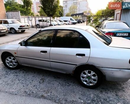 Сірий Міцубісі Lancer, об'ємом двигуна 1.3 л та пробігом 371 тис. км за 990 $, фото 1 на Automoto.ua