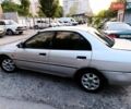 Сірий Міцубісі Lancer, об'ємом двигуна 1.3 л та пробігом 371 тис. км за 990 $, фото 1 на Automoto.ua