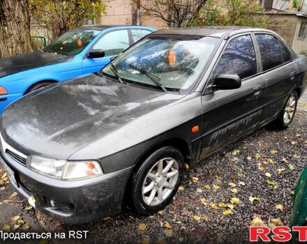 Сірий Міцубісі Lancer, об'ємом двигуна 1.3 л та пробігом 111 тис. км за 1800 $, фото 1 на Automoto.ua