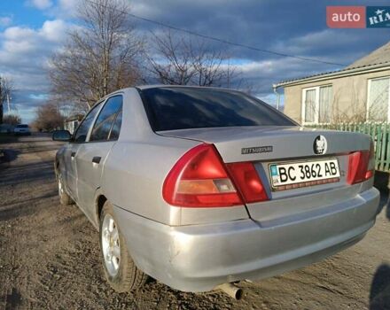 Серый Мицубиси Лансер, объемом двигателя 1.3 л и пробегом 390 тыс. км за 1800 $, фото 6 на Automoto.ua