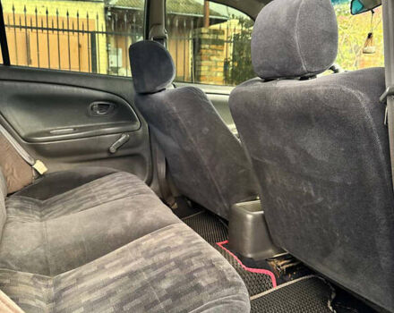 Сірий Міцубісі Lancer, об'ємом двигуна 1.3 л та пробігом 302 тис. км за 950 $, фото 6 на Automoto.ua