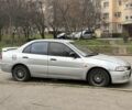 Сірий Міцубісі Lancer, об'ємом двигуна 1.3 л та пробігом 200 тис. км за 1100 $, фото 1 на Automoto.ua
