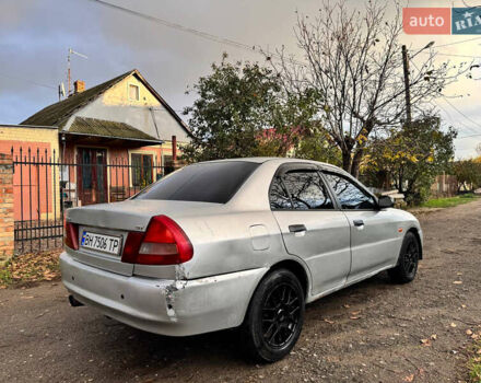 Сірий Міцубісі Lancer, об'ємом двигуна 1.3 л та пробігом 302 тис. км за 950 $, фото 2 на Automoto.ua