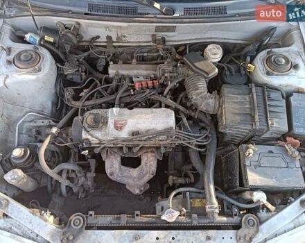 Серый Мицубиси Лансер, объемом двигателя 1.3 л и пробегом 390 тыс. км за 1800 $, фото 9 на Automoto.ua