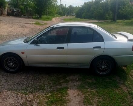 Сірий Міцубісі Lancer, об'ємом двигуна 1.3 л та пробігом 346 тис. км за 2500 $, фото 4 на Automoto.ua