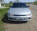Серый Мицубиси Лансер, объемом двигателя 1.3 л и пробегом 320 тыс. км за 1750 $, фото 1 на Automoto.ua