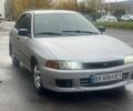 Сірий Міцубісі Lancer, об'ємом двигуна 1.3 л та пробігом 378 тис. км за 1203 $, фото 1 на Automoto.ua