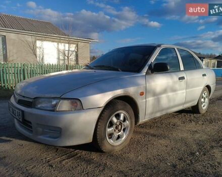 Серый Мицубиси Лансер, объемом двигателя 1.3 л и пробегом 390 тыс. км за 1800 $, фото 2 на Automoto.ua