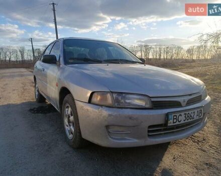 Серый Мицубиси Лансер, объемом двигателя 1.3 л и пробегом 390 тыс. км за 1800 $, фото 25 на Automoto.ua