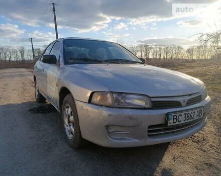 Сірий Міцубісі Lancer, об'ємом двигуна 1.3 л та пробігом 390 тис. км за 1800 $, фото 25 на Automoto.ua