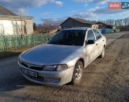 Серый Мицубиси Лансер, объемом двигателя 1.3 л и пробегом 390 тыс. км за 1800 $, фото 26 на Automoto.ua