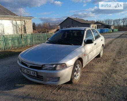 Сірий Міцубісі Lancer, об'ємом двигуна 1.3 л та пробігом 390 тис. км за 1800 $, фото 1 на Automoto.ua