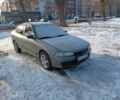 Серый Мицубиси Лансер, объемом двигателя 1.3 л и пробегом 449 тыс. км за 1600 $, фото 1 на Automoto.ua