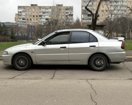 Сірий Міцубісі Lancer, об'ємом двигуна 1.3 л та пробігом 200 тис. км за 1100 $, фото 4 на Automoto.ua