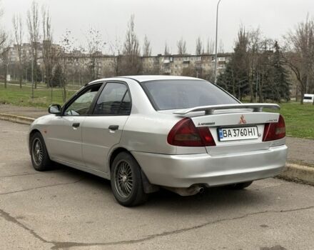 Сірий Міцубісі Lancer, об'ємом двигуна 1.3 л та пробігом 200 тис. км за 1100 $, фото 3 на Automoto.ua