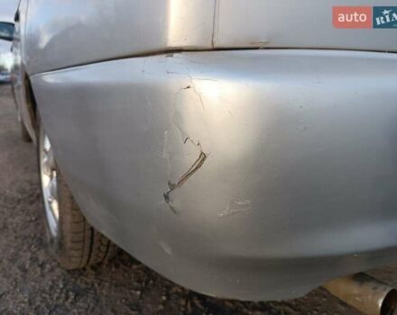 Серый Мицубиси Лансер, объемом двигателя 1.3 л и пробегом 390 тыс. км за 1800 $, фото 44 на Automoto.ua