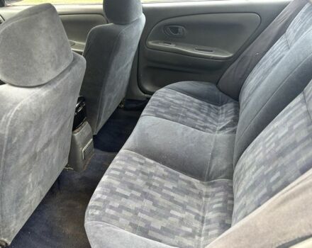 Сірий Міцубісі Lancer, об'ємом двигуна 1.3 л та пробігом 200 тис. км за 1100 $, фото 6 на Automoto.ua