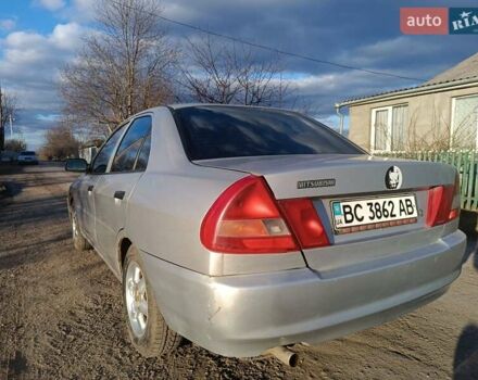 Серый Мицубиси Лансер, объемом двигателя 1.3 л и пробегом 390 тыс. км за 1800 $, фото 5 на Automoto.ua