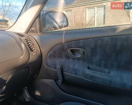 Серый Мицубиси Лансер, объемом двигателя 1.3 л и пробегом 390 тыс. км за 1800 $, фото 37 на Automoto.ua