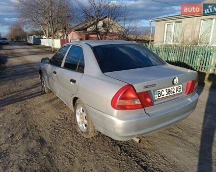 Серый Мицубиси Лансер, объемом двигателя 1.3 л и пробегом 390 тыс. км за 1800 $, фото 28 на Automoto.ua