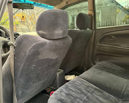 Сірий Міцубісі Lancer, об'ємом двигуна 1.3 л та пробігом 302 тис. км за 950 $, фото 5 на Automoto.ua