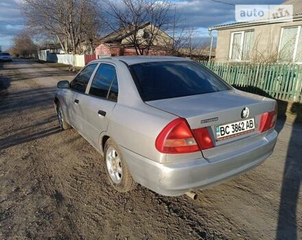 Сірий Міцубісі Lancer, об'ємом двигуна 1.3 л та пробігом 390 тис. км за 1800 $, фото 3 на Automoto.ua