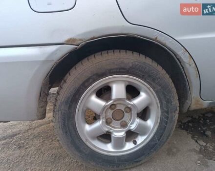 Серый Мицубиси Лансер, объемом двигателя 1.3 л и пробегом 390 тыс. км за 1800 $, фото 21 на Automoto.ua