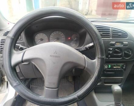 Серый Мицубиси Лансер, объемом двигателя 1.3 л и пробегом 367 тыс. км за 1050 $, фото 11 на Automoto.ua