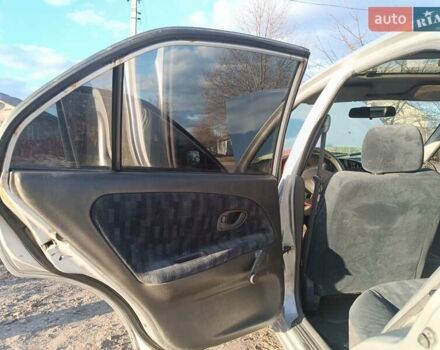 Серый Мицубиси Лансер, объемом двигателя 1.3 л и пробегом 390 тыс. км за 1800 $, фото 31 на Automoto.ua