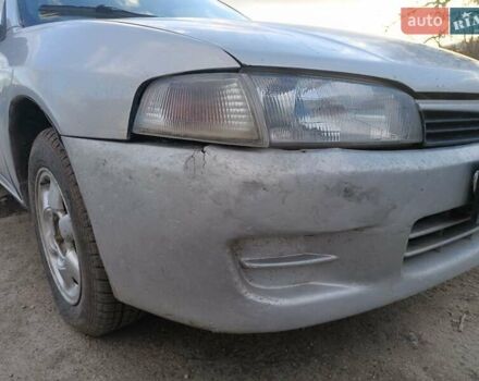 Серый Мицубиси Лансер, объемом двигателя 1.3 л и пробегом 390 тыс. км за 1800 $, фото 23 на Automoto.ua