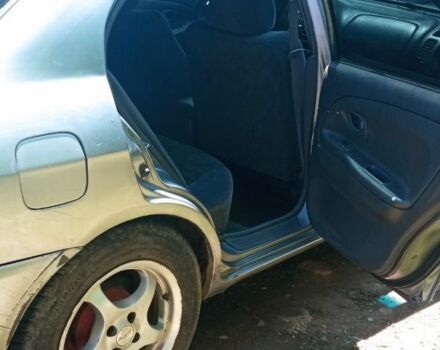 Сірий Міцубісі Lancer, об'ємом двигуна 1.3 л та пробігом 362 тис. км за 2300 $, фото 5 на Automoto.ua