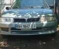 Сірий Міцубісі Lancer, об'ємом двигуна 1.3 л та пробігом 362 тис. км за 2300 $, фото 1 на Automoto.ua