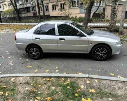 Серый Мицубиси Лансер, объемом двигателя 1.3 л и пробегом 157 тыс. км за 1679 $, фото 3 на Automoto.ua