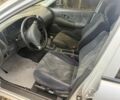 Сірий Міцубісі Lancer, об'ємом двигуна 1.3 л та пробігом 555 тис. км за 875 $, фото 3 на Automoto.ua