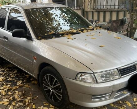 Сірий Міцубісі Lancer, об'ємом двигуна 1.3 л та пробігом 555 тис. км за 875 $, фото 2 на Automoto.ua