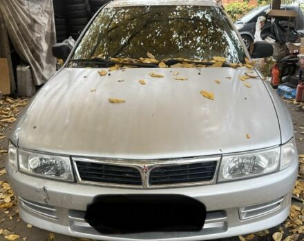 Сірий Міцубісі Lancer, об'ємом двигуна 1.3 л та пробігом 555 тис. км за 875 $, фото 1 на Automoto.ua